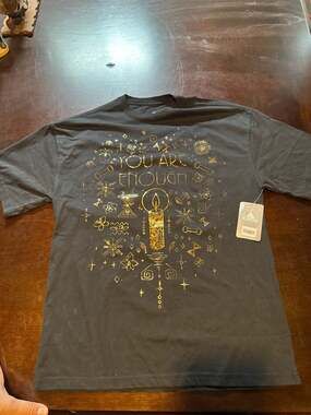 Disney Encanto Gold Foil 'You Are Enough' Mirabel Miracle Candle Black T-Shirt